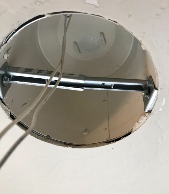 how to replace recessed lighting with a chandelier, first part of the adapter installed in can