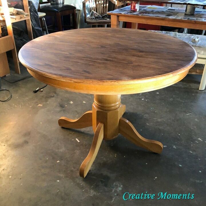 oak dining table is stained over existing finish