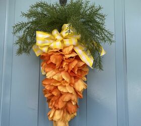 9 easter porch ideas that are so darn cute, Her cute floral carrot wreath