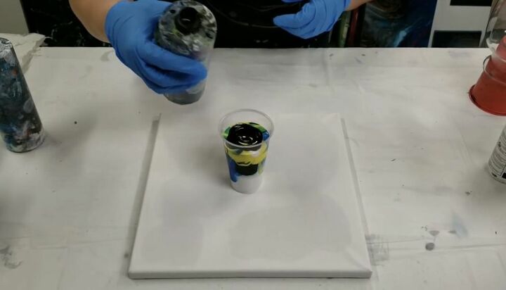 diy acrylic pour vase and canvas for 10, Mix Paints with Floetrol and Combine in Cup