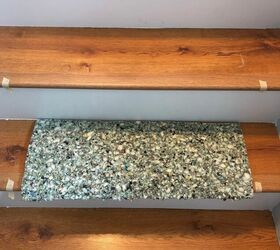 Put bits of masking tape on your stairs for the easiest update we've ever seen