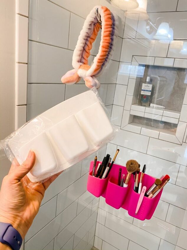 storage and organizing make up and essentials in a small bathroom