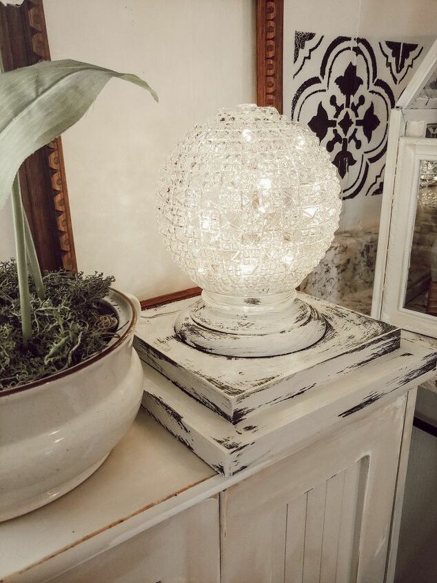 basket light fixture and fairy light globe