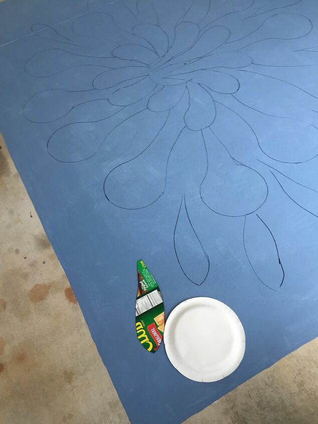 painting a rug on concrete, draw design