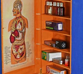 upcycled wine box into a medicine cupboard