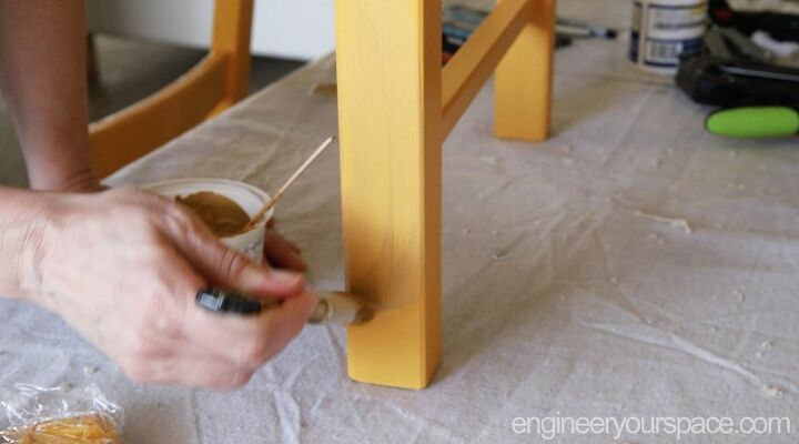 ikea chair hack with a little bit of paint and some fabric
