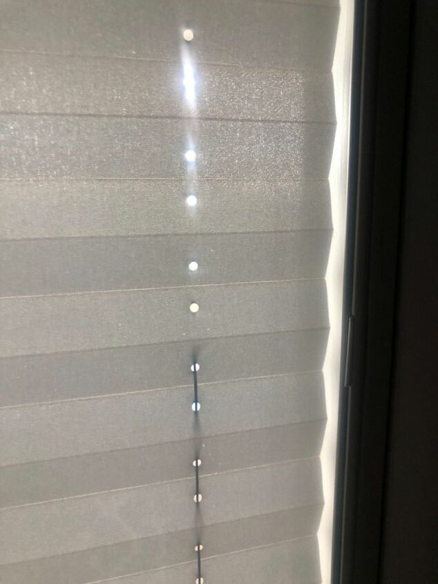 q how do i fix a curtain hanging inside my sliding glass door