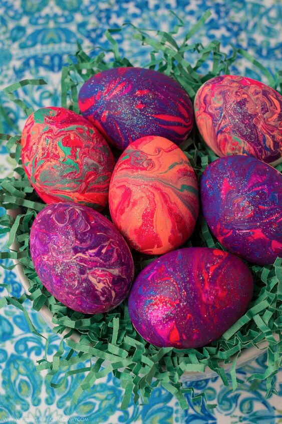 s 15 easter egg decorating techniques we can t wait to try this year, Marbelize with nail polish glitter