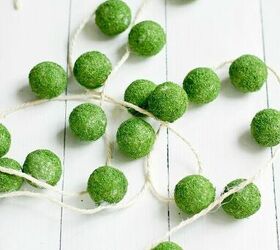 s 15 spring decor ideas that will brighten your home this week, Make a faux moss ball garland