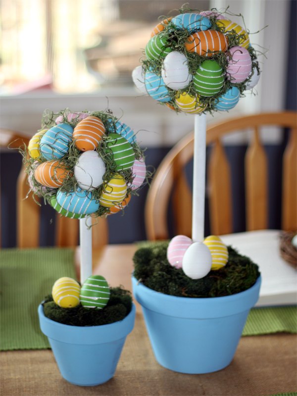 s 15 playful easter decorations that go beyond colorful eggs, Create an egg topiary