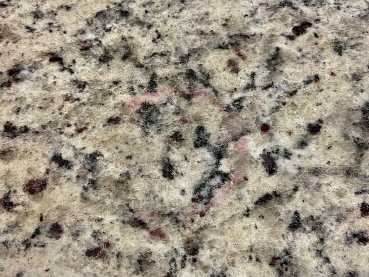 q i spilled red wine on my countertop what can i use to remove this