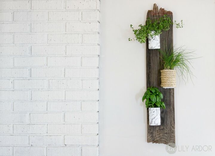 15 maneiras criativas de animar suas paredes com vasos suspensos, Plantador de m rmore para a parede