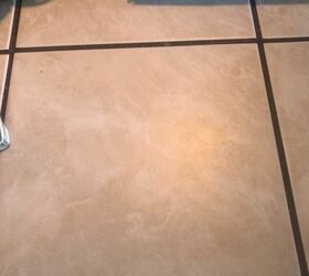 i bought a house with tile countertop how can i cover and hide grout