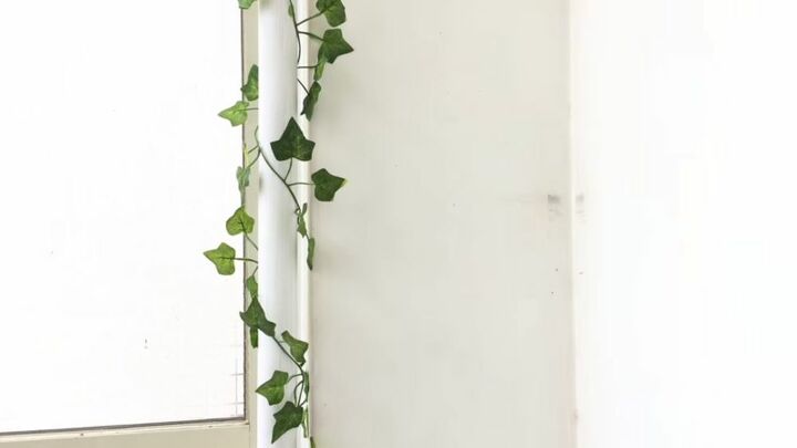 the perfect small balcony makeover in 10 simple steps, Decorate Plumbing Pipe with Faux Ivy