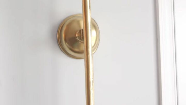 you can create an elegant wall sconce with a bathroom plunger, Hang