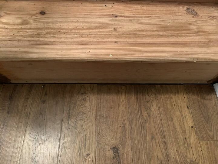 how do i fill a gap between flooring and bottom stairs