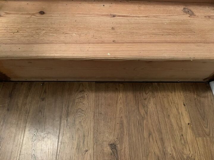 q how do i fill a gap between flooring and bottom stairs