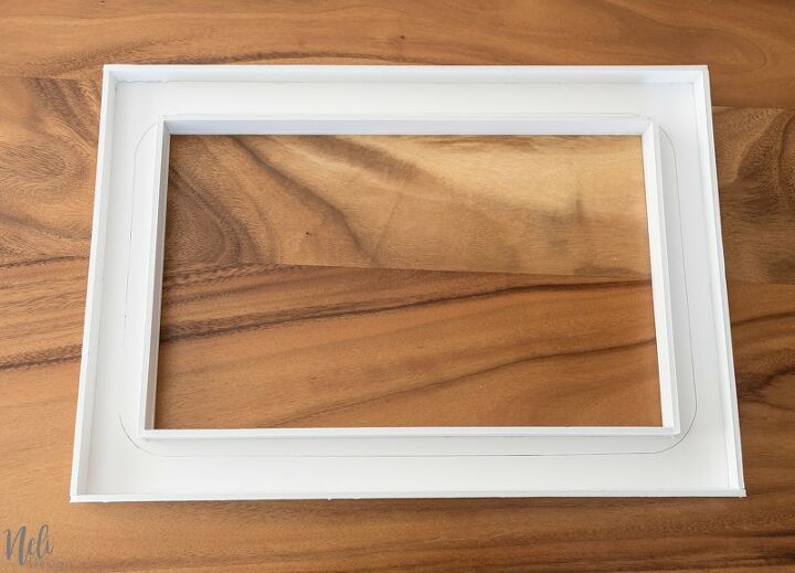 diy frame to hide a cookie sheet