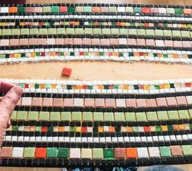 how to transform a coffee table with mosaic art, Laying tiles in centre
