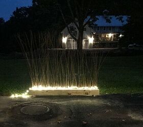 make a diy lighted privacy fence using ikea branches