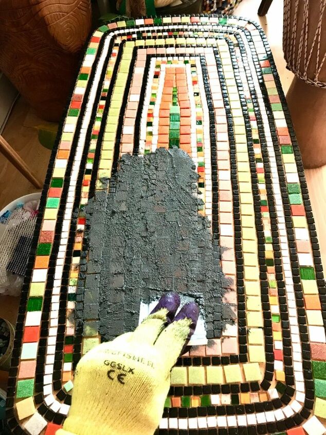 how to transform a coffee table with mosaic art, Grouting the table