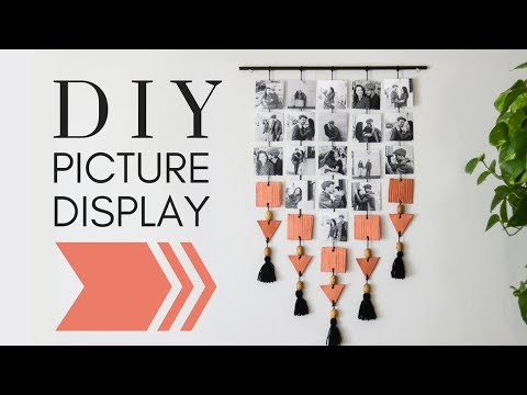 s 13 fun things you can do to show off your boxed up family photos, Hang pictures in this DIY display