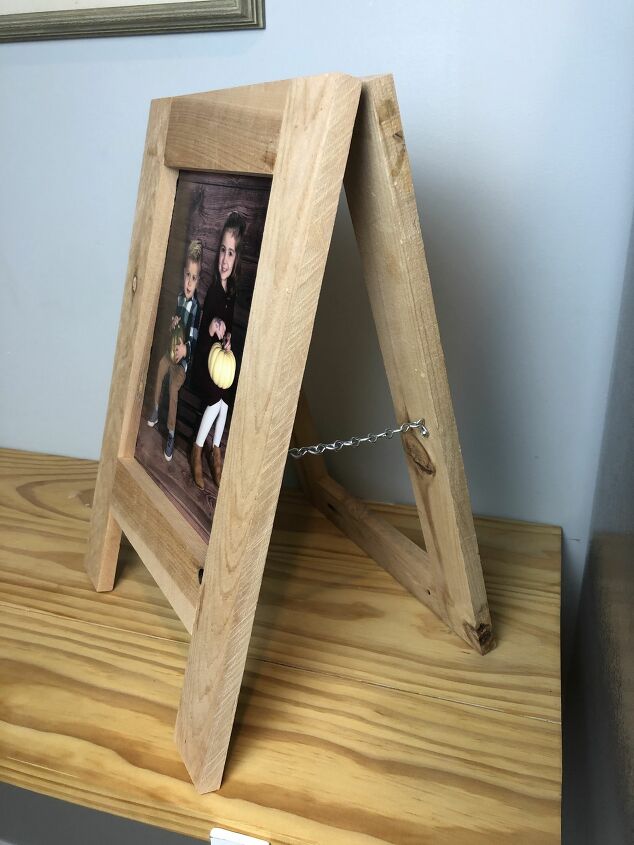 s 13 fun things you can do to show off your boxed up family photos, DIY a sandwich board style picture frame