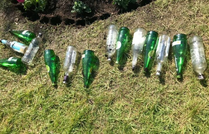 how to use your old glass bottles to create nice flower bed border, Old glass bottles