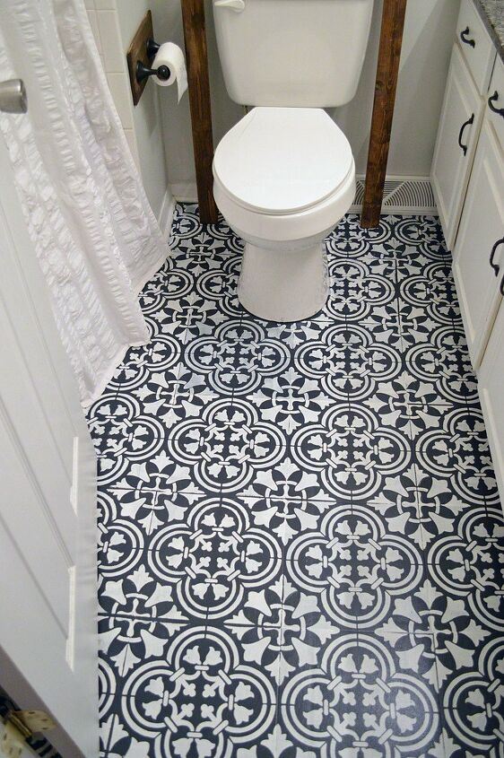 12 creative bathroom floor upgrades you can do without a full reno, Stencil over linoleum for a desiger look