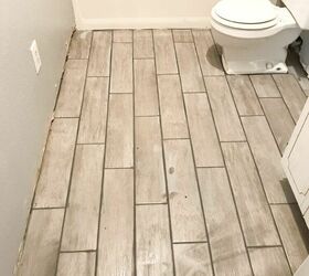12 creative bathroom floor upgrades you can do without a full reno, Install ceramic tiles