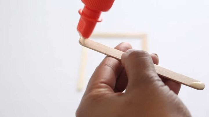 unlock your creativity with these simple popsicle stick decorations, Glue the Popsicle Sticks into Squares