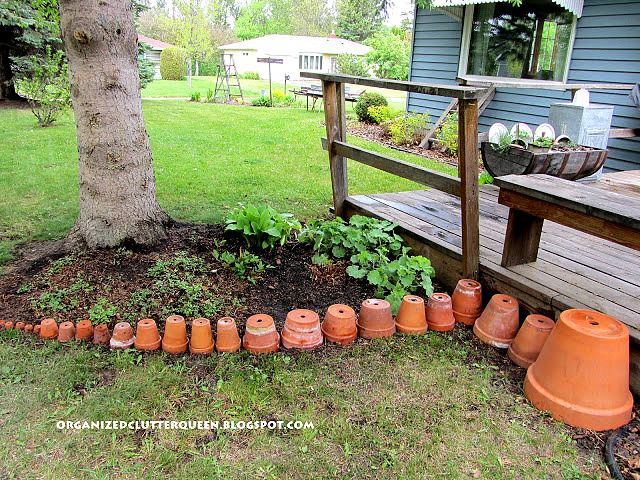 13 gorgeous garden edging ideas to try out this season, Set up terracotta pots around your garden