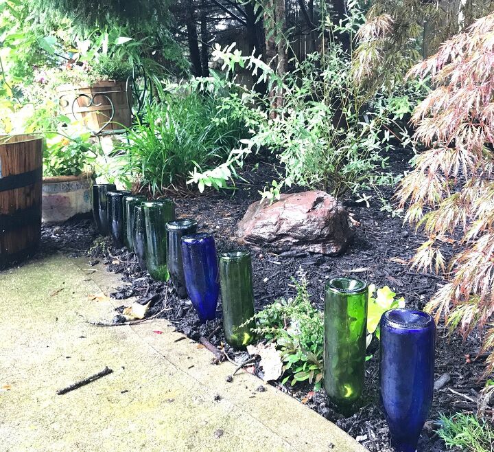 13 gorgeous garden edging ideas to try out this season, Upcyle wine bottles for a creative border
