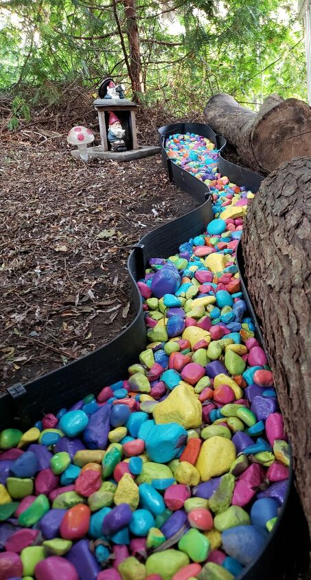 13 gorgeous garden edging ideas to try out this season, Spray paint rocks for a rainbow river edge