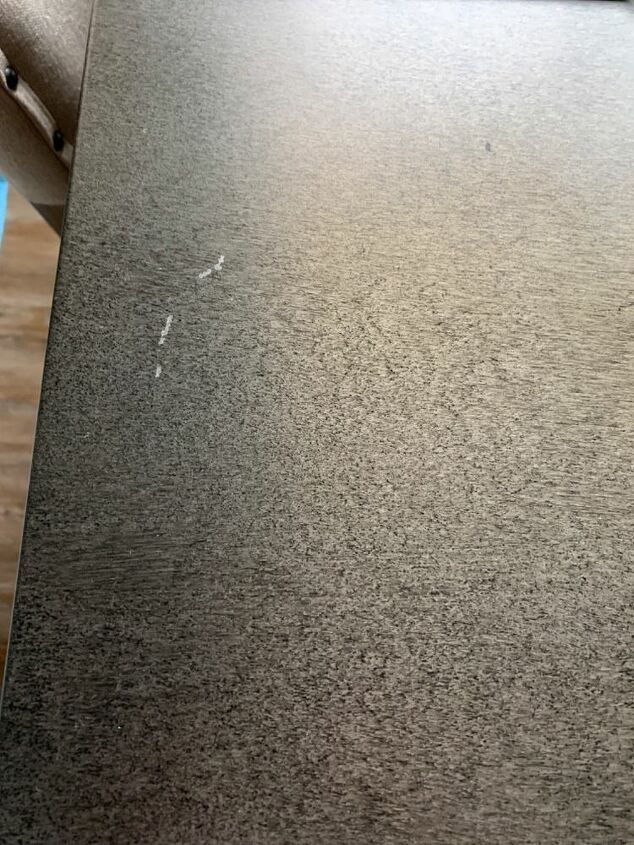 q how do i fix chips on a stainless steel table