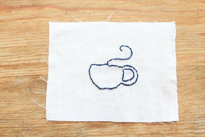 toalha de ch com bordado de xcara de ch