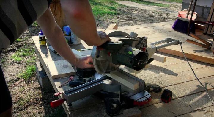 recycle old wood into a chic wood and glass coffee table, Cut the Legs