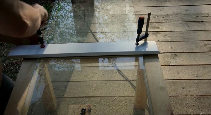 recycle old wood into a chic wood and glass coffee table, Clamp the Other Side