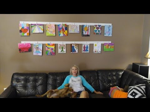 11 creative ways to save and display kids art, Build a living room display from pine boards