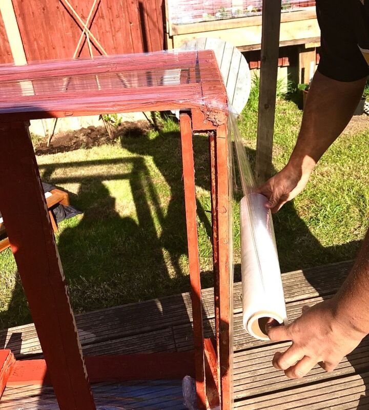 how to upcycle an old bed base into a cold frame, Shrink wrap sides
