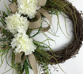 s 13 gorgeous ways to brighten up your decor with faux flowers, Grapevine Hydrangea Wreath