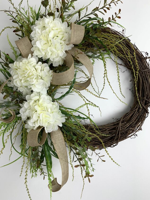 s 13 gorgeous ways to brighten up your decor with faux flowers, Grapevine Hydrangea Wreath