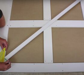 put together an easy modern farmhouse barn door in only 8 steps, Add Cross Braces