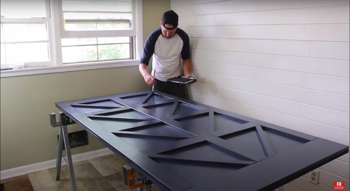 put together an easy modern farmhouse barn door in only 8 steps, Touch Up with a Paintbrush