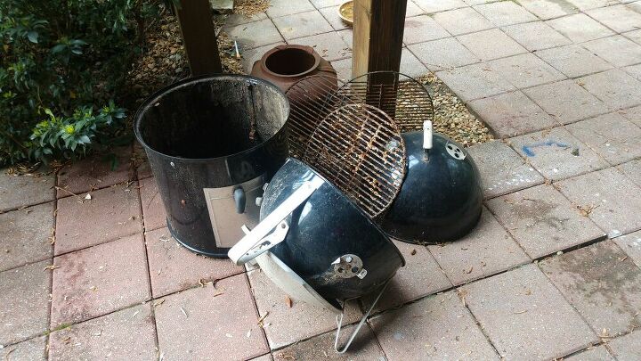 meat smoker finds new life as a lovely flower planter