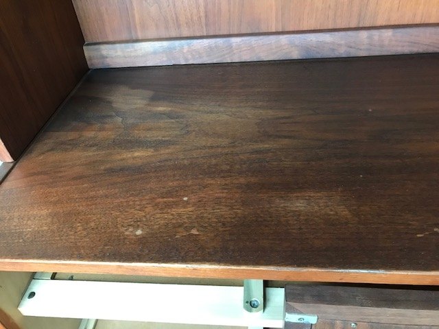 q how to repair waters stains on cabinet help
