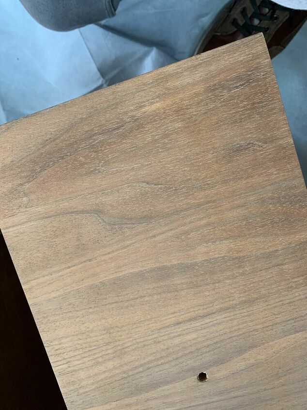 q how to remove these weird spots on the face of these drawers