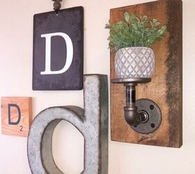 s 15 charming ways to add farmhouse decor to your home, Transform plumbing pipes into a candle holder