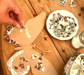 how to transform broken crockery into a beautiful piece of yard art, Stick the tesserae on to base