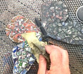 how to transform broken crockery into a beautiful piece of yard art, Cleaning off excess grout
